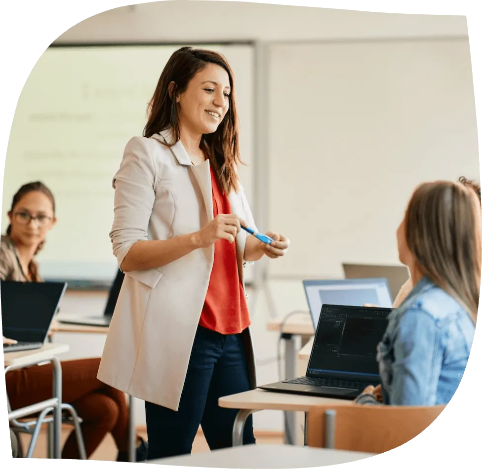 Teacher guiding a classroom presentation
